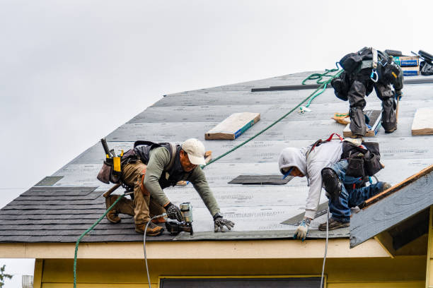 Professional Gutter Installation technician working in Lawrenceville, GA